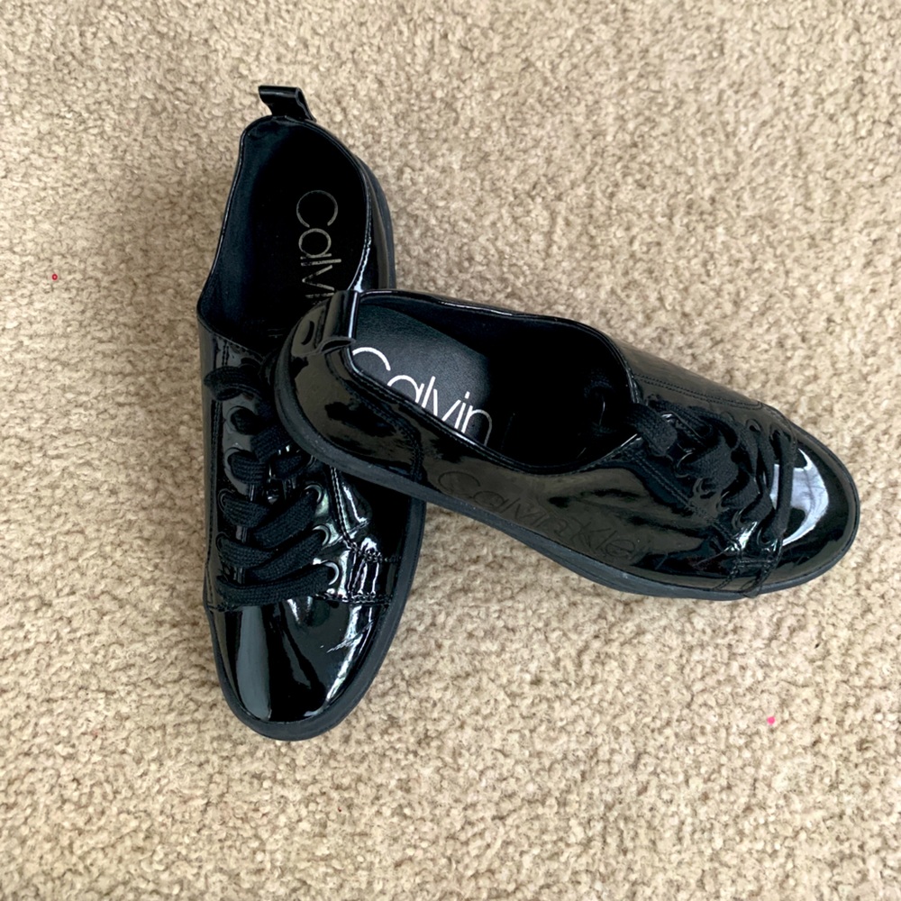 Black patent Calvin Klein sneakers